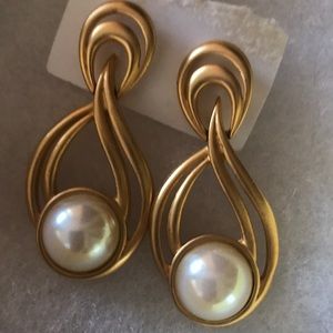 Never used gold and pearl earrings.